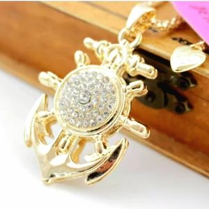 Gold crystal anchor pendant necklace